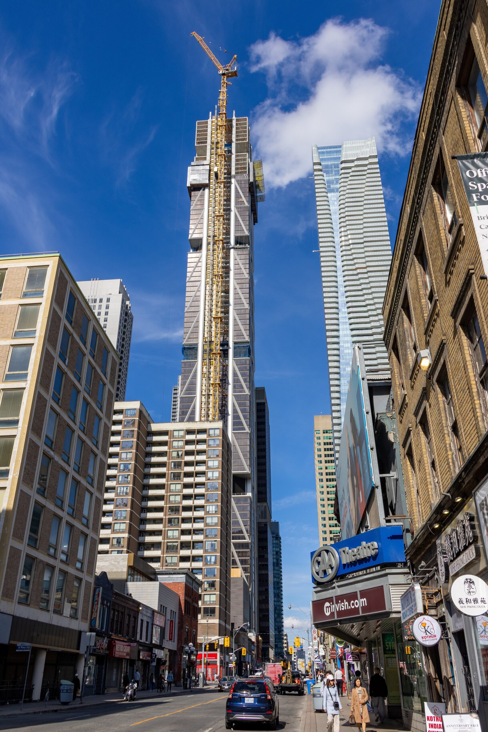 Looking up at the One Bloor West tower from Yonge Street, October 2025