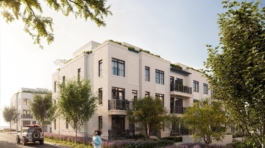 South Banks coastal townhomes at Lakeview Village seen from the street, with landscaped boulevards (artist’s concept)